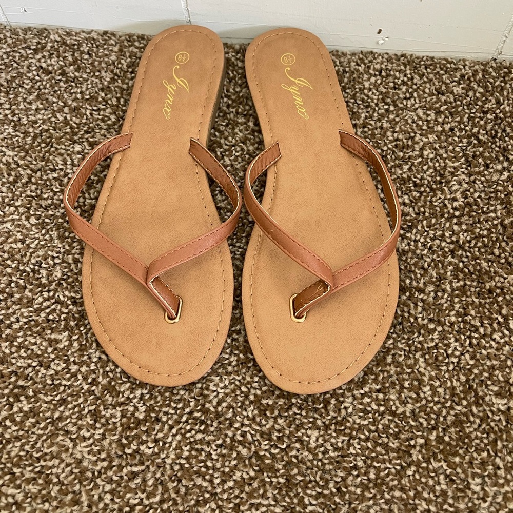 Brand-new boutique flip-flops.